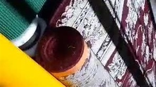 رول کردن فرش توسط دستگاه اتوماتیک قالیشویی اسمیاکو