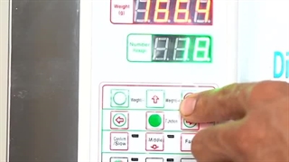 دستگاه پرکن پودر و گرانول 200 -2 گرم