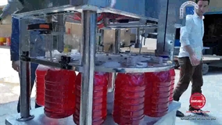 دستگاه پرکن و درب بندی گالن 5 لیتری PET توان صنعت | 09152000050