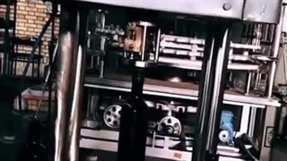 دستگاه دربند نیمه اتوماتیک شیشه روغن زیتون وآبلیمو | 09152000050